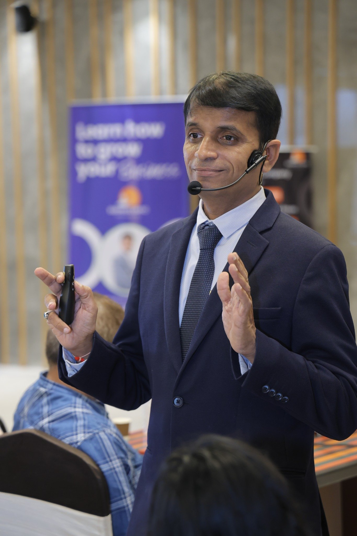 Vijay Patel speaking to an audience